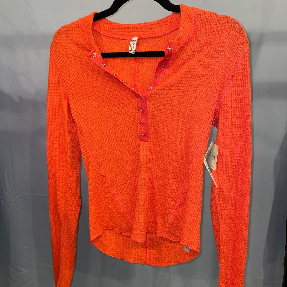 Free people Size M bright orange top.